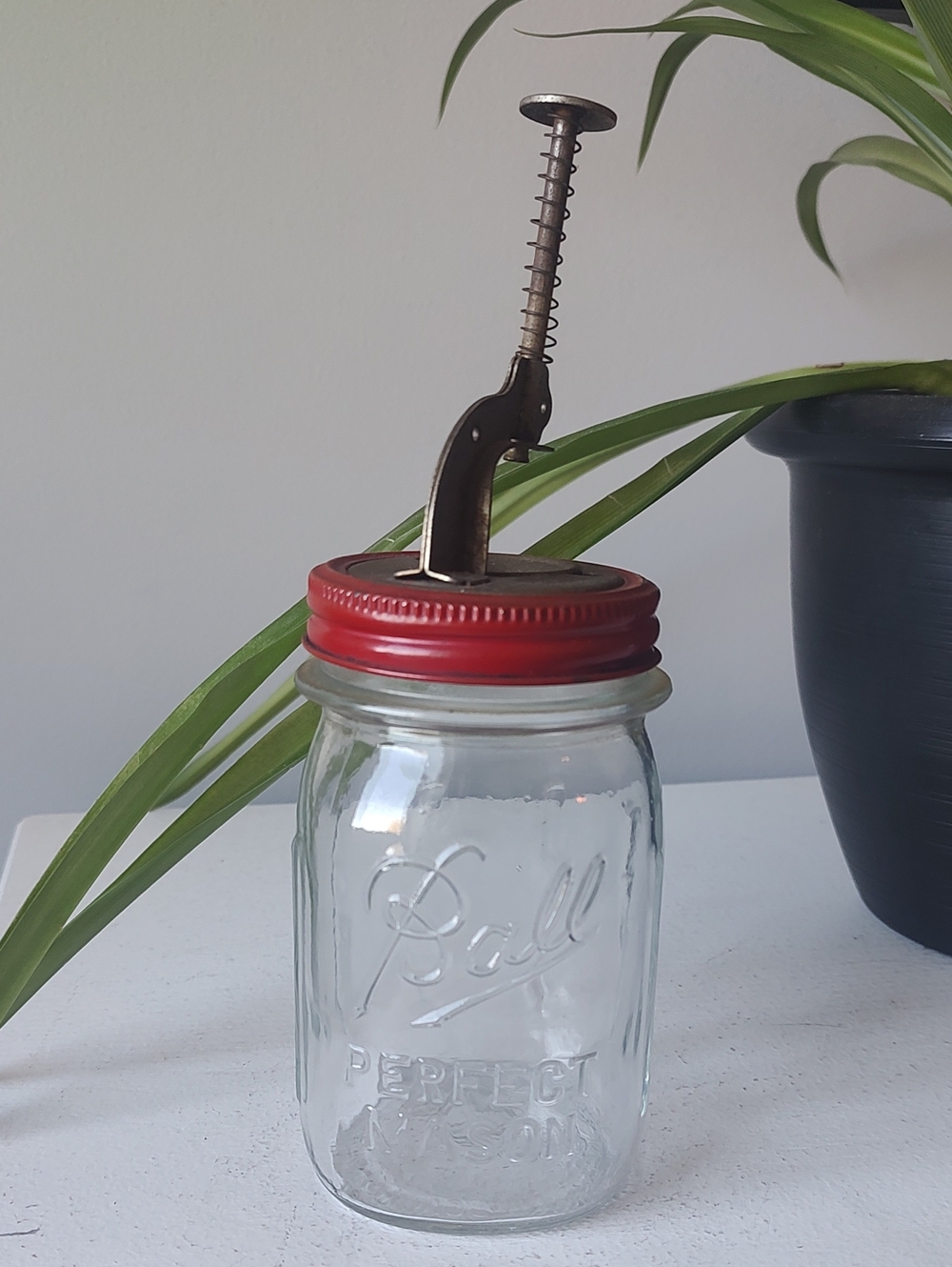 Vintage Krasco Cherry Pitter Attached To A Glass Mason Jar